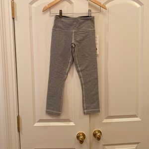 Lululemon size 2 leggings.  New with tags never worn before. Super cute pattern.